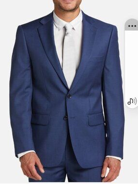 Calvin clien blue nice suit worn twice, still in the bag. Shoes to go with it